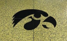 Poly Coated Garage Floor With The Iowa Hawkeyes Logo
