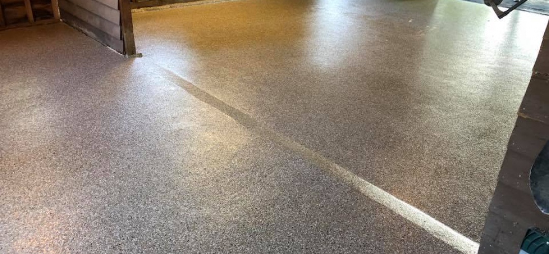 poly coated garage floor with work space