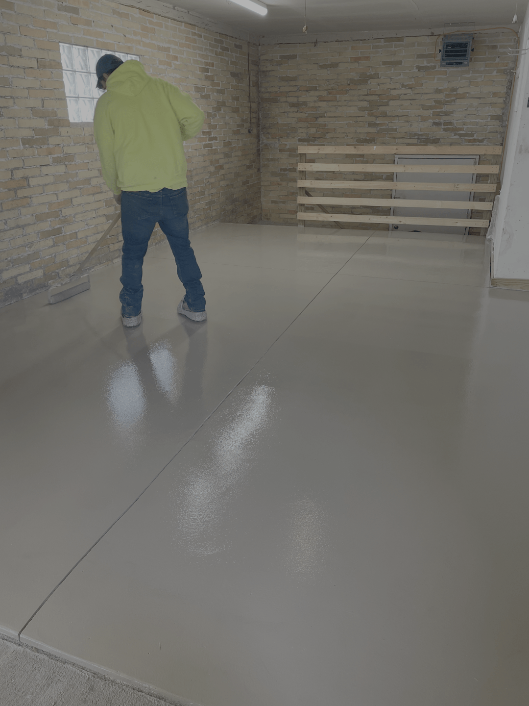 Base coat application in Williamsburg, IA garage